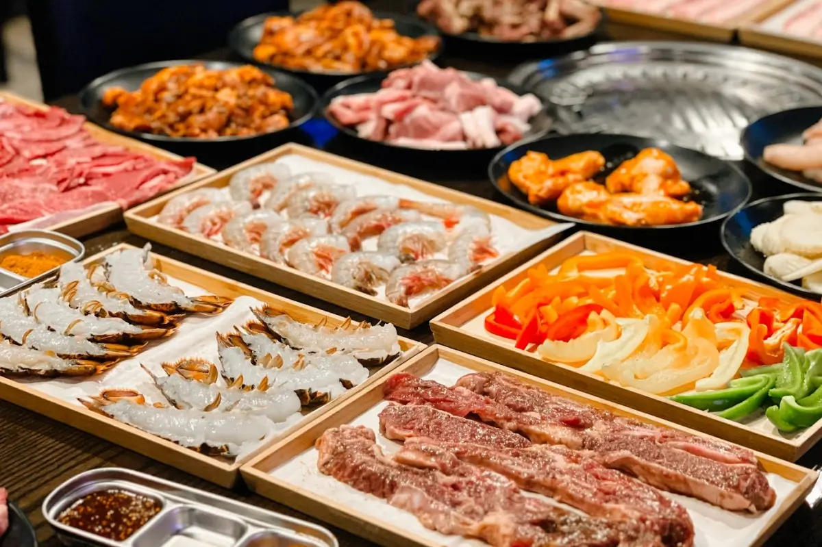 Grilled ribs with side dishes at Oriental Flame, a Korean BBQ restaurant in San Angelo